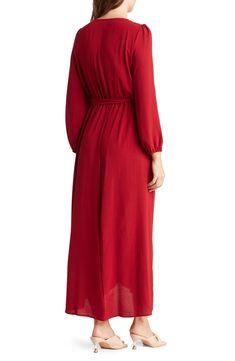 A faux-wrap maxi dress offers flattering style with gently puffed sleeves and a tie waist. 56" length Surplice V-neck Long sleeves Slips on over head Elastic waist with tie sash High-low hem Unlined 100% polyester Machine wash, tumble dry Imported Model stats: 5'10" height, 32" bust, 25" waist, 36" hip. Model is wearing size 4. Sleeve Maxi Dress, Long Sleeve Maxi, Puffed Sleeves, Maxi Wrap Dress, High Low Hem, Long Sleeve Maxi Dress, High Low, Puff Sleeve, Elastic Waist