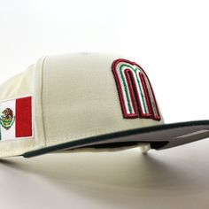 a baseball cap with the mexican flag on it