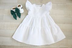 Girls white linen dress with ruffles. Great for Christmas, weddings, Baptism or any other event!  *Listing includes: - dress +   Warning- Color may different on your screen and in real life, do to different settings and devices  +   Please be understandable, each work is individually created and can vary by a few mm-cm ! That's why it would be good if you could send the individual measurements -  1) full child height 2) chest circumference.  I will make this outfit exactly for your child accordi White Hose, Ruffle Dresses, White Linen Dress, White Ruffle Dress, White Linen Dresses, Little Outfits, Handmade Clothes, Linen Dress, White Linen