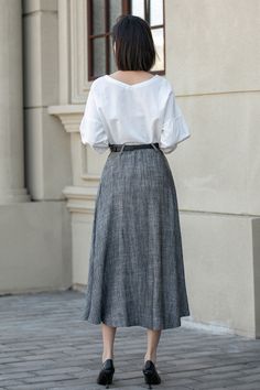 Enhance your wardrobe with our captivating "Elegant Flow" charcoal pleated skirt. Designed to offer both comfort and style, this skirt guarantees a flattering fit and elegant movement, allowing you to exude charm and grace wherever you go. Elevate your fashion game with this must-have addition to your collection. #elegance #charcoalpleatedskirt #flatteringfit #gracefulmovement Elegant Long Gray Skirt, Gray Relaxed Maxi Skirt With Lined Skirt, Elegant Gray Flowy Skirt, Gray Relaxed Maxi Skirt With Lining, Gray Relaxed Fit Lined Maxi Skirt, Gray Relaxed Fit Maxi Skirt With Lining, Gray Flared Maxi Skirt With Lined Skirt, Gray Flared Maxi Skirt With Lining, Gray Flared Skirt For Work