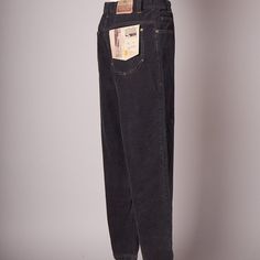 The Pants Are In Deadstock Condition, With Tags Still Attached. They Are A Black Corduroy. Fly Zips With Metal Venue Zipper And Buttons At The Top. Made By Gotcha. Marked A Size 30 And Measures 39 Cm Across Waist, 33 Cm Rise, 66 Cm Inseam. Black Corduroy Straight Leg Jeans, Vintage High Rise Black Pants, Vintage Black Bottoms With Five Pockets, Vintage Black Trousers, Black Corduroy Pants, Flat Pant, Chino Pants Men, Tommy Hilfiger Pants, Pants Vintage