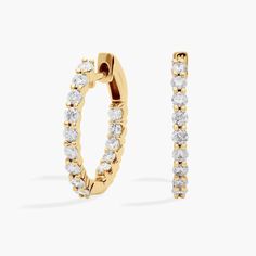 Opt for timeless sophistication when you wear these eternity hoop earrings. Each earring boasts a lustrous 14k yellow gold design encircled by an endless row of shimmering diamonds. Blue Nile, Diamond Eternity, Gold Design, Hoop Earrings, Diamonds, Yellow Gold, Yellow, Gold, Design