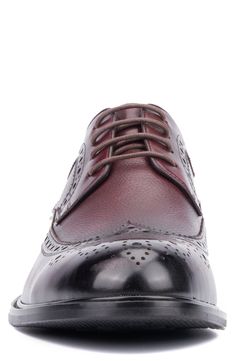 Brogue stitching on the vamp elevates the look of a burnished leather derby finished with a wingtip toe timeless intrigue. Leather upper/leather and textile lining/rubber sole Imported Burgundy Brogue Lace-up Oxfords, Burgundy Leather Brogue Shoes With Round Toe, Burgundy Leather Shoes With Brogue Detailing, Burgundy Leather Shoes With Brogue Detailing Round Toe, Burgundy Lace-up Oxfords With Brogue Detailing, Burgundy Cap Toe Leather Shoes With Brogue Detailing, Vintage Brogue Derby Shoes With Plain Toe, Vintage Brogue Detailed Derby Shoes, Goodyear Welted Burgundy Oxfords With Plain Toe