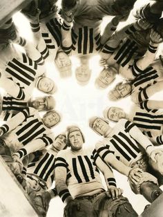 a group of people standing in a circle