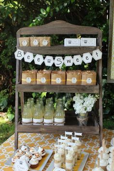 the dessert table is set up outside for an outdoor party