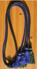 a blue and black rope on top of a wooden floor