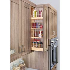 Create a custom storage rack right at home using the Rev-A-Shelf Soft Close Cabinet Organizer. This kitchen storage organizer system is designed to fit existing 30-inch full-height cabinets to maximize hard-to-reach space. This package includes a wood organizer, adjustable shelves, chrome rails, and mounting hardware for an at-home DIY installation. Neatly organize all of your spices and cooking seasonings inside this convenient pull-out shelving unit. This fully assembled organizer transforms t Spice Rack Wall, Pull Out Kitchen Cabinet, Kitchen Wall Cabinet, Wood Organizer, Kitchen Wall Cabinets, Rev A Shelf, Cabinet Organizer, Custom Storage, Kitchen Cabinet Organization