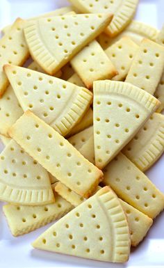 some crackers are laying on a white plate