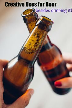 two brown beer bottles being held by one another with the caption learning cheers in a new language