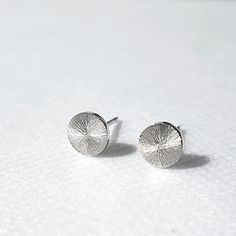 These simple stylish stud earrings in sterling silver are individually designed using traditional silversmithing techniques in my London workshop. All made by hand and custom to your taste, they require up to 2 business days to be dispatched.  ‣‣ Minimalist design for everyday outfits ‣‣ Pure handmade unique present for yourself and your loved ones ‣‣ Gift boxed with a personalised message card ‣‣ Free, fast, and secure delivery  ‣‣ 13% OFF with this coupon:  https://www.etsy.com/uk/shop/AndyKashtanJewellery?coupon=1STPURCHASE MORE DETAILS: These stylish contemporary stud earrings are handcrafted from quality recycled sterling silver sheet using traditional silversmithing techniques in my London studio. A circle is sawed and soldered to the pin. The components are then polished to mirror o Minimalist Earrings With Polished Finish As Gift, Minimalist Polished Earrings As Gift, Minimalist Polished Earrings For Gifts, Argentium Silver Jewelry, Bespoke Jewellery Design, Unique Silver Jewelry, St Valentine, Silver Gift Box, Circle Earrings Studs