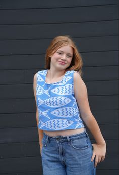 Make a splash with the Blue Fish Crop Top! 🐟 Fit: Comfortable, boxy, relaxed fit perfect for summer days. Features: Crafted from soft Turkish Cotton with playful fish patterns. Why We Love It: This fun and breezy crop top adds a touch of whimsy to any outfit, making it perfect for beach outings or casual strolls. 🌊💙 Handcrafted with love in the Carolinas! Each piece is truly one-of-a-kind, made with sustainable Turkish Cotton. Experience artisanal charm and craftsmanship in every stitch. Colo Playful Short Sleeve Crop Top For Summer, Playful Sleeveless Crop Top For Summer, Playful Blue Tops For Summer, Light Blue Cropped Tops For Summer, Playful Summer Crop Tops, Playful Crop Top For Summer, Casual Light Blue Crop Top For Vacation, Playful Cropped Tops For Spring, Playful Cropped Crop Top For Spring