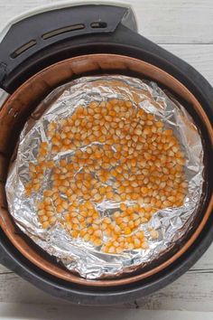 the food in the crock pot is ready to be cooked and put into the oven