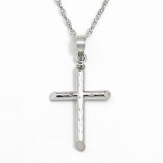 Divine shine. Diamond-cut details give this cross pendant a heavenly glow. You're sure to treasure this 10k white gold necklace. Tube design adds modern beauty to the cross. Details:  .94-in. pendant 18-in. 14k gold-filled chain Spring-ring clasp 10k white gold Size: One Size. Gender: female. Age Group: adult. Cheap Cross Pendant Necklaces For Jewelry Making, Sterling Silver Diamond Cut Cross Pendant Necklace, Sterling Silver Cross Necklace With Diamond Cut, Sterling Silver Diamond Cut Cross Necklace, Diamond Cut Cross Pendant Necklace, White Gold Cross Pendant, White Gold Necklace, Gold Cross Pendant, White Gold Necklaces