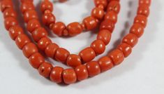 -Antique 9k Gold Natural Orange Red Coral Necklace -Total length: 16 in -Biggest bead size:5.75 mm x 5.65 mm -Smallest bead size: 4.25 mm x 5.4 mm -Total weight: 19.7 g -Not perfectly round Classic Formal Beads, Classic Round Polished Beads, Classic Round Beads For Formal Occasions, Classic Red Hand-strung Jewelry, Classic Single Strand Beads As Gift, Red Coral Necklace, Coral Necklace, Red Coral, Necklace Etsy