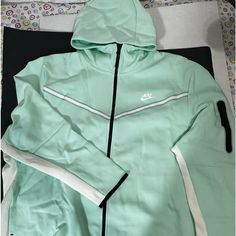 Nike Tech Fleece Jacket Brand New Brand New With Its Tags Size 4xl Mint Green Color Green Fleece Athleisure Outerwear, Sporty Green Fleece Outerwear, Sporty Green Hooded Fleece Jacket, Nike Long Sleeve Fleece Jacket For Outdoor Activities, Nike Green Hooded Jacket For Sports, Nike Fleece Hooded Jacket With Pockets, Green Fleece Long Sleeve Track Jacket, Green Long Sleeve Fleece Track Jacket, Nike Fleece Outerwear With Pockets