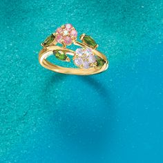 Ross-Simons - .93 ct. t. w. Multi-Gem Flower Ring in 18kt Gold Over Sterling. Size 9. Our ring is the pick of the season with pretty blooms of .93 ct. tot. gem wt. pink tourmaline, white topaz, tanzanite and green chrome diopside in a bypass design. 18kt yellow gold over sterling silver setting. Multi-gemstone flower ring. Fine Jewelry Flower-shaped Multi-stone Rings, Diamond Multi-stone Flower Ring, Flower Shaped Diamond Ring With Multi-stones, Yellow Gold Flower-shaped Multi-stone Rings, Yellow Gold Flower-shaped Rings With Multi-stone, Yellow Gold Floral Multi-stone Rings, Flower-shaped Multi-stone Ring For Anniversary, Multi-stone Flower Ring Fine Jewelry, Fine Jewelry Yellow Gold Flower Ring