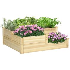 three wooden planters filled with flowers and greenery