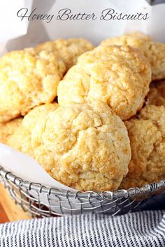 honey butter biscuits in a basket on a table