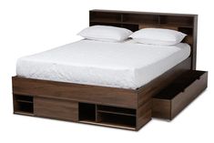 the bed is made and has two drawers on each side that are open for storage