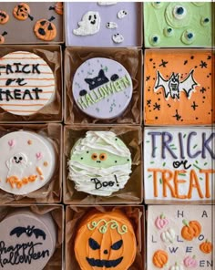 halloween decorated cookies in boxes with words on them and decorations around the edges for trick or treat