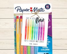 a package of paper mate pens with the words just a little rau written on it