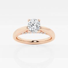 1 1/8 ctw Cushion Lab Grown Diamond Arch Engagement Ring 14K Rose Gold FG, SI1+ Rose Gold Diamond Ring With Vs Clarity, 14k Rose Gold Round Diamond Ring, Rose Gold Diamond Ring With Round Cut Accents, 14k Rose Gold Round Cut Diamond Ring With Accents, 14k Rose Gold Diamond Ring With Round Cut Accents, Rose Gold Diamond Ring With Diamond Accents, Round Cut, Side Stone Engagement Ring, Rose Gold Diamonds, 1 Carat