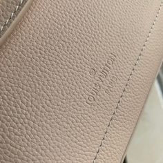 the inside of a white leather purse