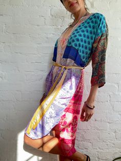 "This is one of a kind patchwork, upcycled silky robe Made free size with wrap tie closing  Easy and fun to wear around the house or outside as a urban boho style,  flowy kardigan with jeans and tshirt  It is very comfy and feels soft and light  the material is colourful and lightweight  made into this unique stylish over all MEAESURE free size length 40\" MATERIAL *vintage silk  * no lining more available at  https://www.etsy.com/shop/AltheaStores? CARE INSTRUCTIONS  * Wash in warm water * Hand Colorful Kimono, Urban Boho, Silky Robe, Pool Bath, House Coat, Up House, Womens Robes, T Shirt And Jeans, Beautiful Skirts