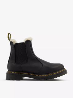 Dr. Martens leather boots70% Leather, 30% ElastaneSlips onRound toe, faux-fur lining, elasticated side gussets, yellow welt stitch, grooved midsole, branded pull-tab to the back, air-cushioned soleSpecialist leather cleanUpper: 70% Leather, 30% ElastaneLining: 100% TextileSole: 100% PVC Leather Chelsea Boots, Pull Tab, Chelsea Boots, Chelsea, Faux Fur, Boots, Yellow, Leather, Chelsea Fc