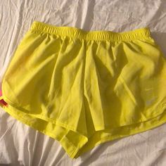 Nwt Yellow Nike Shorts. Never Been Worn. Nike Spring Activewear Shorts, Nike Spring Activewear, Nike Shorts For Jogging, Yellow Stretch Short Leg Bottoms, Nike Running Bottoms, Yellow Athletic Shorts With Built-in Shorts For Spring, Casual Nike Bottoms For Running, Casual Nike Running Bottoms, Yellow Activewear With Built-in Shorts For Spring