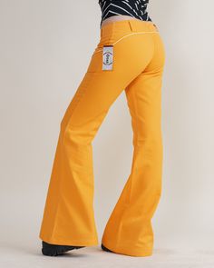 AWESOME DEADSTOCK ORANGE TROUSERS ONE OF A KIND UNWORN SPANISH MADE PIECE SIZE M (would fit smaller L also) BY OTZI MEASURED LAID FLAT 16,5IN WAIST  35,5IN INSIDE LEG  ON LBL 44 Model usually wears size M/EU38/UK10 trousers for biggest high street brands and is 168cm tall. Has quite slim legs and curvy hips (approx 98cm). Great deadstock condition (unworn vintage), keep in mind that it is vintage item and signs of natural wear/age might appear, might have small spot or dot due to storage. Labels that are in the pictures might not be where when you get parcel as you might get pair that didnt have full label. If you have any questions about item don't hesitate to message us.  When buying from HungerVintage you support small sustainable bussiness.  Thank you!  Orders over 50 are shipped in re Retro Fitted Mid-rise Pants, Retro Mid-rise Pants, Retro Stretch Bottoms With Pockets, Retro Fitted Full Length Pants, Retro Fitted Bottoms With Pockets, Retro Stretch Cotton Pants, Retro Stretch Mid-rise Bottoms, Retro Mid-rise Stretch Bottoms, Retro Slim-fit Bottoms With Pockets