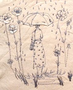 a drawing of a woman with an umbrella in the middle of flowers and grass on a piece of paper