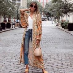 Yellow Bohemian Kimono, Bohemian Free Size Kimono For Day Out, Free Size Bohemian Kimono For Day Out, Yellow Bohemian Kimono For Vacation, Yellow Bohemian Kimono For Summer, Bohemian Orange Printed Kimono, Casual Orange Kimono For Spring, Yellow Bohemian Summer Kimono, Casual Orange Spring Kimono