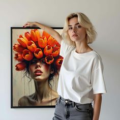 a woman standing in front of a painting with orange flowers on her head and hands behind her back