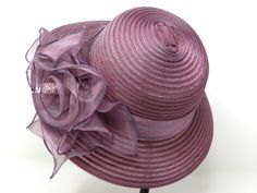 Item: women's summer panama hat Material: 100% yarn Size: one size fits most Flower: chiffon flower is elegantly lace up with ribbon all around the hat Shipping: free USPS first class mail Return: 30 days return policy Spring Wide Brim Boater Hat For Church, Wide Brim Boater Hat For Church In Spring, Purple Wide Brim Hat For Spring, Elegant Adjustable Lined Sun Hat, Kentucky Derby Floral Hats, Kentucky Derby Flower Hats, Spring Adjustable Cloche Hat For Church, Spring Church Boater Hat With Wide Brim, Elegant Lined Sun Hat For Spring