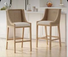 two wicker bar stools in a kitchen