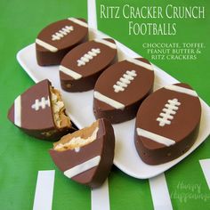 chocolate footballs are on a plate with crackers