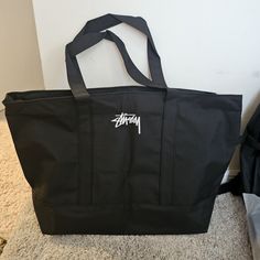 New Never Used! This Listing Features A Stussy Brand Large Size Tote Bag! Great For Both Men And Women! Bundles Welcome For Discounted Shipping. Visit My Page For More Items! No Cancellations! All Sales Are Final. No Returns/Refunds. Large Capacity Tote Bag For Streetwear, Casual Black Travel Bag For Shopping, Stussy Bag, Tote Bag Men, Soccer Bag, Tote Bags For School, School Tote, Bags Aesthetic, Duffel Bags