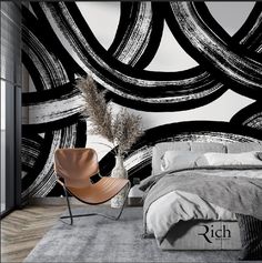 a modern bedroom with black and white wallpaper