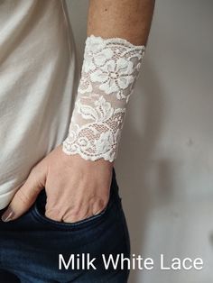 "Versatile, long stretch lace wrist cuff bracelet in Milky white - visit my shop for more designs Handbands, wrist cuffs, wrist wraps - visit my shop for more color matching accessories *Handmade with love and care in a smoke free home *Every wrist cuff is sewn by me *Ideal for covering wrist tattoos *Stretchy and soft lace *Fabulous accessory for your outfit *Goes well with everything *Unique and standing out COLOR: Milk white MATERIALS: stretch lace SIZE: choose from the drop down menu If you Adjustable Cream Bracelet For Weddings, Adjustable Cream Bracelet For Wedding, Adjustable White Cuff Bracelet, Adjustable White Cuff Bracelet For Parties, White Adjustable Cuff Bracelet For Party, Adjustable White Cuff Bracelet For Party, Tattoo Cover Up, Wrist Tattoo Cover Up, Tattoo Cover