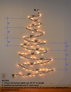 a christmas tree made out of lights is shown with measurements for the height and width