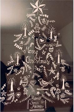 a christmas tree made out of cut outs