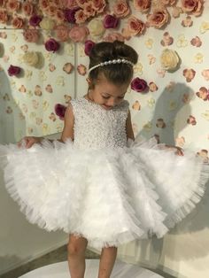 Our fully hand-embroidered fluffy dress with white pearls is prepared with the highest quality materials. In white pearls, your daughter will look like a princess. It is prepared from 1 year to 10 years old. The pearl crown is our gift. A birthday photo shoot will be a great choice for a very special day like graduation. pleasant shopping White Embellished Princess Dress, White Ruffled Pageant Dress For First Communion, White Princess Pageant Dress With Ruffles, Princess Style White Embellished Dress, White Princess Style Embellished Dress, Party Princess Dress With Pearl Embroidery And Tulle, White Princess Dress With Pearl Embroidery, White Embellished Princess Dress For Pageant, White Embellished Princess Dress For Wedding