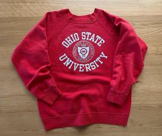 Vintage Ohio State sweatshirt from the 80s. Clean, classic design. Super soft and comfortable! Tag says medium, fits more like a small.  Please find measurements in photos. Amazing condition with light wear (see photos) for a vintage sweatshirt! Vintage Letter Print Sweatshirt For Game Day, Retro Game Day Sweatshirt For Winter, Retro Sweatshirt For Game Day In Winter, Retro Winter Game Day Sweatshirt, Vintage Crew Neck Fan Gear Sweatshirt, Vintage Fan Gear Sweatshirt With Crew Neck, Vintage Crew Neck Sweatshirt For Fans, Retro Fall Fan Gear Sweatshirt, Retro Fan Gear Sweatshirt For Fall