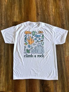 Climb a Rock! I design, print, and ship all shirts myself. The shirt has a vintage cotton-like look and feel, but is 100% polyester for softness and breathability! Sunday Clothes, Silly Shirt, Rock T Shirt, Weird Shirts, Rock T Shirts, Girl Fits, I Design, A Rock, The Shirt