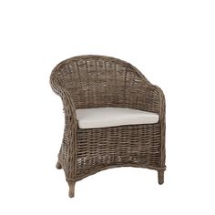 an outdoor wicker chair with white cushions