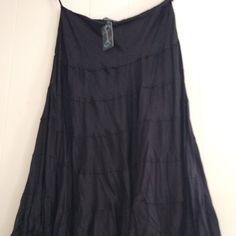 Bohemian Cafe Black Skirt Size 18 Womans Waist 38 Inches From Waist To Hem 38 Inches 8" Zipper On Side Of Skirt 50 % Rayon - 50 % Viscose Brand New Never Worn Black Bohemian Maxi Skirt For Summer, Black Bohemian Maxi Skirt For Festival, Bohemian Black Maxi Skirt For Festival, Black Bohemian Summer Skirt, Black Bohemian Maxi Skirt For Vacation, Black Bohemian Long Skirt, Black Flared Beach Skirt, Black Flared Skirt For Beach, Black Flared Skirt For The Beach