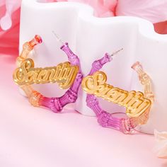 Item: 2023EA0051 Material: Acrylic Color: Blue&Pink,Pink&Orange,Black&Green,Brown,Black&White,Brown&White Process:  Gold Plated Recipient: Woman, Mom, Wife, Girl Friend, Children, Family Product Type: Personalized Jewelry Gift Type: Earrings Occasions: Valentine's Day, Mother's Day, Christmas, Birthday, etc Earrings Type: Name Earrings Brand: Silviax Jewelry Trendy Colorful Hoop Earrings For Party, Trendy Colorful Party Hoop Earrings, Trendy Pink Hoop Earrings As Gift, Trendy Pink Hoop Earrings For Summer, Trendy Personalized Earrings For Party, Personalized Pink Earrings For Party, Pink Personalized Party Earrings, Name Earrings, Bamboo Earrings