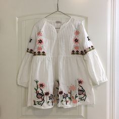 Nwt Size Large. White Embroidered Top For Fall, White Long Sleeve Tops With Floral Embroidery, White Floral Embroidery Long Sleeve Tops, Spring Embroidered Long Sleeve Top, Spring Embroidered Long Sleeve Top With Hem Detail, White Tops With Floral Embroidery For Day Out, Spring Embroidered White Blouse, Embroidered White Blouse For Spring, White Long Sleeve Blouse With Embroidered Hem