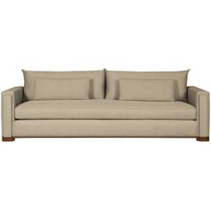 an image of a couch with pillows on the top and bottom half, in beige linen